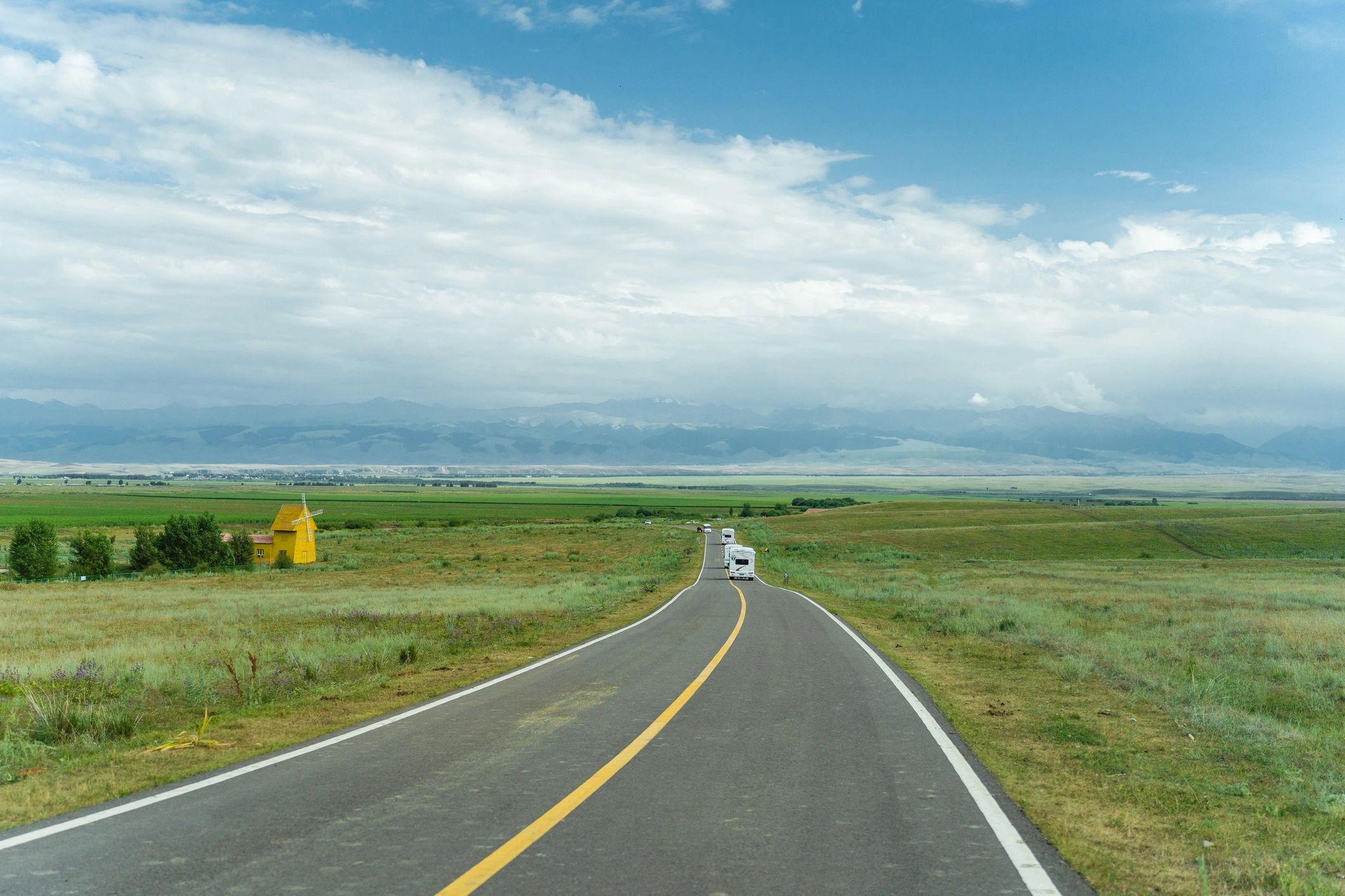 Open road under big sky, representing planning and tools for safe travel