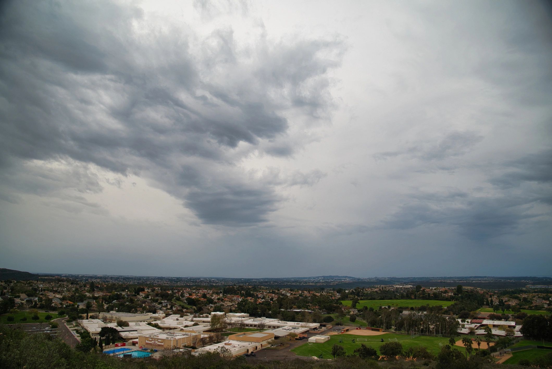 Storm clouds over a neighborhood