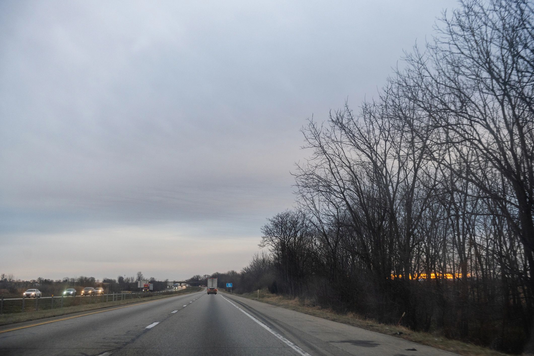 Overcast highway scene with low visibility conditions