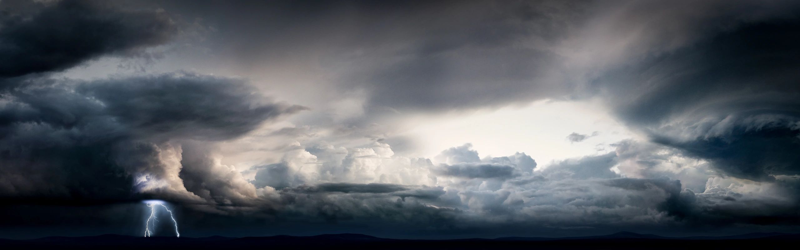 Thunderstorm over a desert landscape
